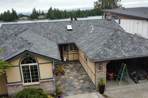A completed Malarkey Windsor roof on a waterfront home in Lake Tapps