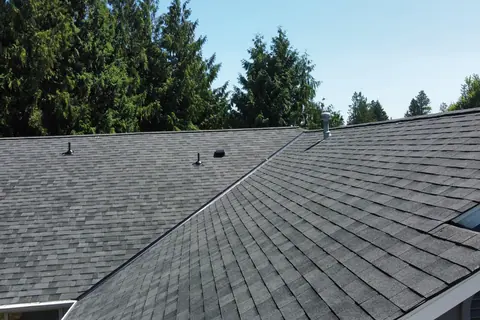 The finished Malarkey Vista shingle field and ridge at Driftwood Point